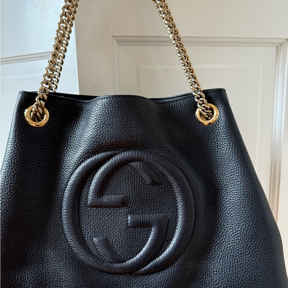 Gucci Black and Gold Leather Shoulder Bag with Embossed Logo - Picture 1 of 5